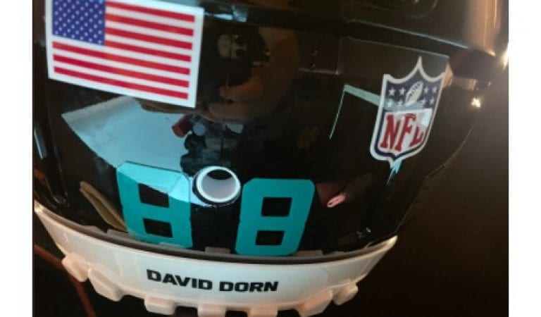 NFL Player Tyler Eifert Goes Against the Grain of Teammates, Honors Fallen Officer David Dorn on Helmet