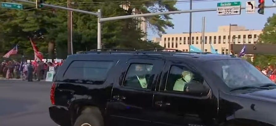 President Trump Drives By And Waves To His Supporters Outside Of Walter Reed Medical Center