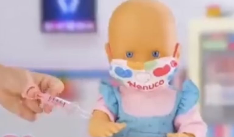 WATCH: Baby Doll Ad Allegedly From Spain Comes With Mask and Vaccination Card