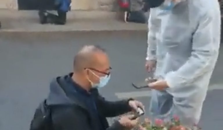 (WATCH) Viral Video of Chinese Kneeling to Authorities While Their Vaccine Passports Are Scanned by Officials