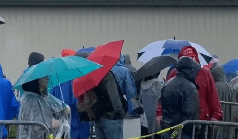 Trump Supporters Form Line In The Rain