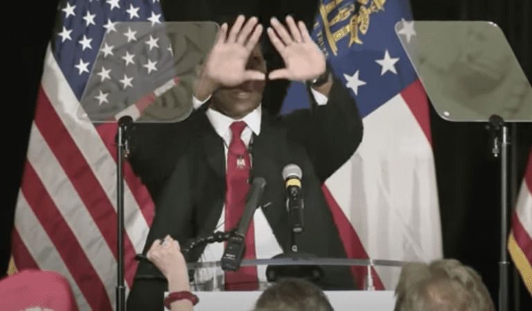 Why Is Herschel Walker Making The Satanic Hand Sign?