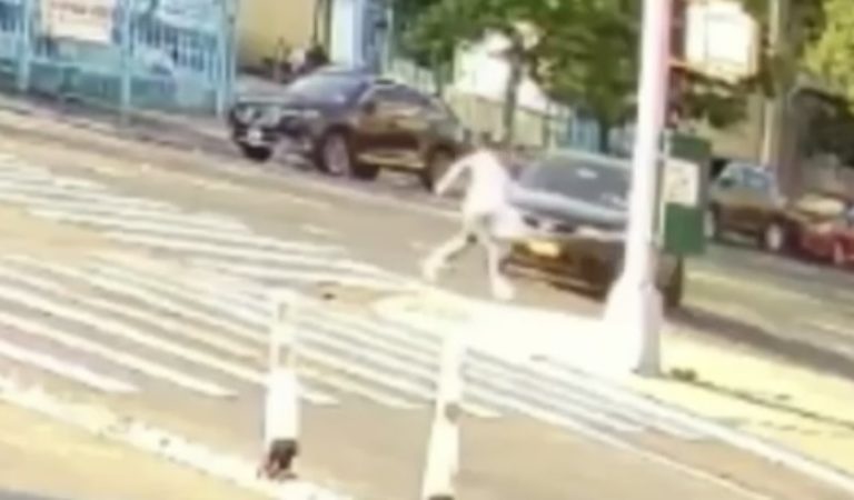 HORRIFYING VIDEO: NYC Pedestrian Hit by Car and Robbed While Lying on the Street Severely Injured (WATCH)