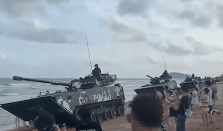 China Vows To “Fight To The Death” — Amasses Tanks On Border