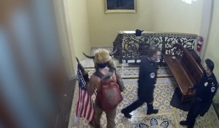 New J6 Footage Shows Capitol Police Escorted “QAnon Shaman” to US Senate Chamber
